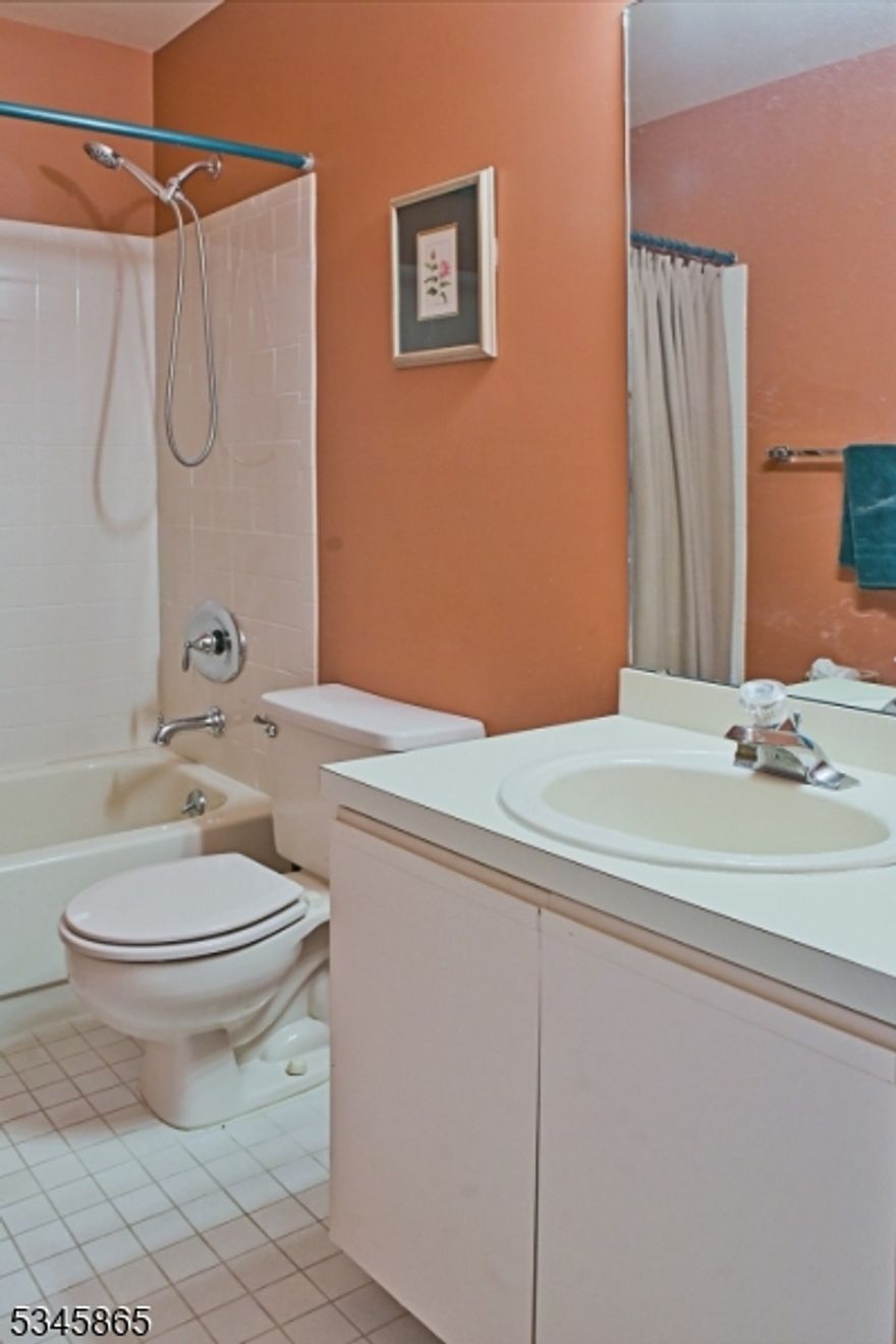 "Stylish 2-bed, 2-bath second-floor condo featuring an updated kitchen with granite countertops, breakfast bar, gas range, microwave, and dishwasher. Enjoy a spacious living room with deck access, separate dining room, and a primary bedroom with dual-sink bathroom and large walk-in closet. Includes a versatile second bedroom (perfect as a home office), in-unit laundry, and an attached garage with direct building entry."