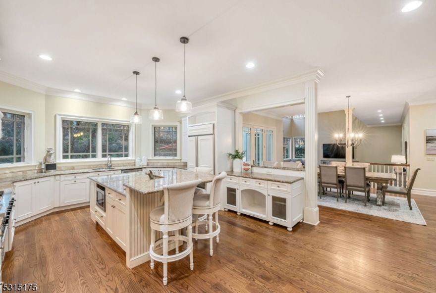 This exquisite Chester estate on one of the town's most coveted streets presents a rare opportunity to experience luxury living at its finest. The home is an architectural masterpiece, boasting high soaring ceilings and an open floor plan designed to impress. The primary suite is conveniently located on the main floor along with an additional en-suite bedroom offering convenience and versatility. Two of the six en-suite bedrooms are located on the main floor. Four other en-suite bedrooms are located on the second floor, two of which have large sitting rooms.The gourmet kitchen is a chef's delight, equipped with top-of-the-line appliances, granite counter tops, and ample storage space. The large bedroom suites offer breathtaking views of the valley, while the beautifully landscaped grounds provide a serene and tranquil environment for relaxation and entertaining. Custom trim work, hardwood, and tile flooring add to the home's elegance, providing a luxurious living space that is both comfortable and sophisticated. This home sits on 3.6 acres with a backyard that has endless possibilities. This meticulously maintained property offers everything you need to move in and start enjoying the lifestyle you deserve. The expansive high-ceiling basement with plumbing for a full bathroom presents limitless potential. **As per owner, there is plenty of room for a pool/pool house.(see documents for drawing)