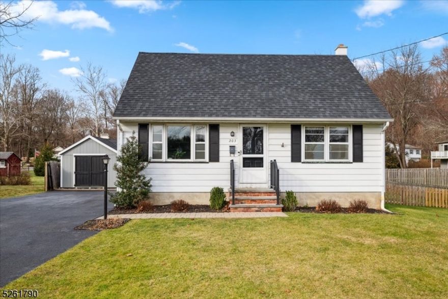 Lovely Expanded Cape in an Unbeatable Location set on a meticulously maintained 1/4-acre lot just minutes to shopping and dining in downtown Hackettstown, as well as Estate Park, Hackettstown Hospital and Direct Train to NYC. With 3 bedrooms, 1.5 baths, enclosed porch and a partially finished basement, there's room for everyone! Gracious curb appeal leads to your front door, ushering you into the main level that starts with a cozy formal living room with crown molding and lots of natural light. Just beyond is a spacious renovated eat-in kitchen with classic white cabinetry, quartz counter tops, farmhouse sink, stainless steel appliances, and an adjacent dining area. Sliding glass doors take you to an enclosed porch with ceiling fan and panoramic views of the flat, fenced-in backyard where you'll have plenty of space for cookouts, relaxing, games and gardening. Past a full hall bath with tub/shower combo you'll find a family room that's perfect for movie nights and informal entertaining. Completing the first floor is a spacious primary bedroom with 2 closets, and the second floor has 2 additional bedrooms, each with a walk-in closet, and a convenient powder room is in the hall. There's more living space in the lower partially level, with recreation/play room, laundry area, utilities, and storage. 2023 paved Driveway, 2022 Roof, and brand new storage shed. Ready for you to move in and enjoy!