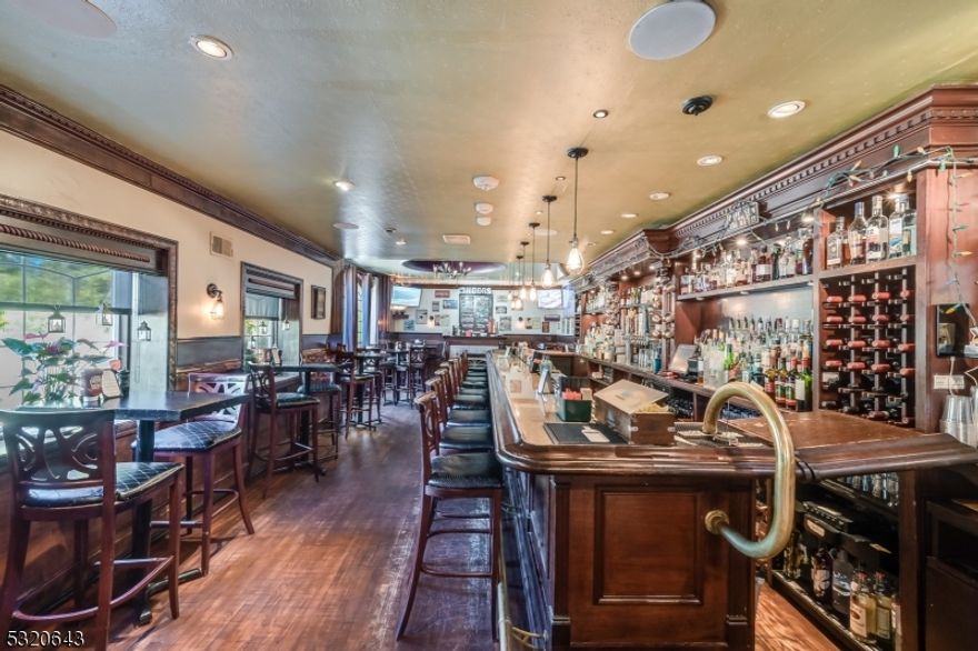 Rare opportunity to purchase a successful turnkey, 130-seat restaurant, property and liquor license with a full sports bar. The property sits on 1.4 acres of land and has 68 parking spots. There is an opportunity to purchase the two (2x) single-family homes located next door as seen in the survey through a separate transaction to assemble (block 2801, Lot 3) which is .34 acres and (block 2801, lot 4) which is .48 acres adding an additional 0.91 acre site zoned C-1 Commercial.The property is surrounded by countless professional buildings, residential residences and is located down the street from Essex County Airport and Rt 46.