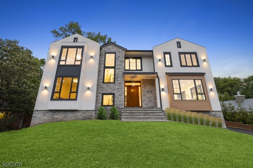 Welcome to this stunning new custom-built estate in the most prestigious part of Short Hills just one block (3-minute walk) from top-rated Hartshorn Elementary. With over 8,000 sq ft of luxurious living space on a beautifully leveled lot backing to serene woods, this 7-bedroom, 7-bath home perfectly blends elegance, comfort, and functionality.At the center is a rare 1,000+ sq ft private courtyard ideal for entertaining with a gas grill hookup. Inside, you're greeted by a dramatic 20-ft great room and a warm modern farmhouse-style family room with 15-ft ceilings and exposed beams. The home offers 10-ft ceilings on the main floor and 9-ft on the upper and lower levels for a spacious, open feel.Highlights include an elegant in-law suite, a gym with private shower and backyard views, a home office overlooking the courtyard, and an elevator. The chef's kitchen features Sub-Zero, Wolf, and Thermador appliances, dual sinks and dishwashers, and solid wood cabinetry.The luxurious primary suite boasts a private balcony, sitting area, and spa bath with radiant floors, double shower, freestanding tub, and custom walk-in closets. The walk-out basement includes a sunlit bedroom, theater, wine room, and two large rec rooms.Built with top-tier materials poured concrete foundation, triple-pane windows, 5  solid oak floors, and more plus a generator, 5-zone HVAC, EV-ready garage, and extensive storage. A rare find offering the best in Short Hills living.