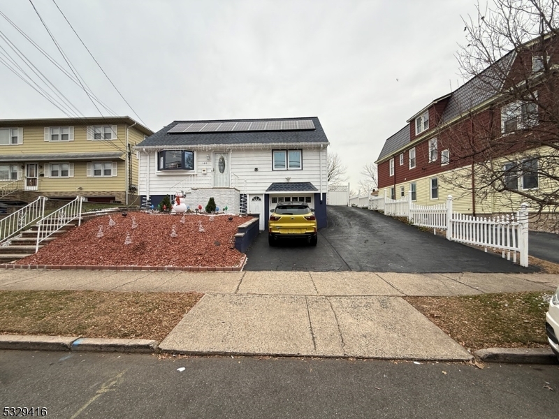 Just move into this modernized house in Paterson close to shopping and public transportation. This home features hardwood floors, two bedrooms, a living room, a dining room, a kitchen, and a full bathroom on the 1st floor. Two bedrooms, and a full bathroom on the 2nd floor. Finished studio in the basement with its separate entrance. There is an enclosed porch and an above-ground pool. It has a laundry room, one attached garage, a long driveway for many cars, a backyard, and a large deck for entertainment. Property sale contingent on seller securing suitable replacement housing