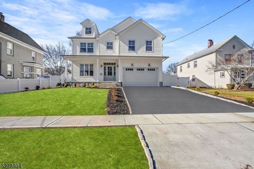 BRAND NEW CONSTRUCTION  Built by Elshiekh Custom Homes! This exquisite home is a true center hall colonial, walk in and be greeted with an opulent view of your foyer, into your formal living room and dining room. The kitchen features Cafe appliances and a gorgeous warm center island combined with  modern white WellBorn cabinets. Notice the attention to detail in your family room with coffered ceilings, a shiplap accent wall and custom built-ins for your comfort and convenience. The first floor also encompasses a walk-in kitchen pantry, mudroom, closet for storage and a powder bath. Enter the second floor into your luxurious primary suite with a spacious walk-in closet and your own spa-like bathroom. The second floor features an en suite bedroom, 2 more bedrooms, a shared bath and a laundry equipped with a sink and cabinets for storage. Walk up another flight of stairs to a full third floor suite equipped with beautiful finishes and plenty of storage. This home also includes a full finished basement with a full bathroom, a superb fenced in yard with room for endless opportunities and a 10 year builder's warranty! Don't forget you are also walking distance to all three schools and Westfield's award winning downtown!!