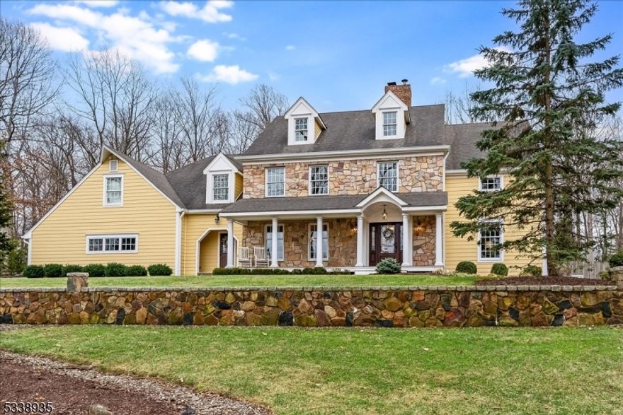 Nestled in the highly sought-after quaint Sandalwood neighborhood, is this turnkey beautifully updated & expertly expanded custom home offering a perfect blend of master artisan craftsmanship & contemporary luxury. Enter to a radiant floor foyer leading into a cozy living area complete with a wood-burning stove & stone fireplace.The chef's kitchen, features a massive center island w/ Granite countertops,Wolf range, Sub Zero, 2-ovens, 2-dishwashers,& 2-sinks, oversized pantry & wine serving station, a dream for culinary enthusiasts.This residence boasts 2 primary suites-1 features a vaulted ceiling, custom closets, & a spa-inspired bath complete with a steam shower, soaking tub & a sitting room. Custom laundry room on the upper level adds convenience. Fully finished bonus spaces on both the 2nd, 3rd & level lower level enhances the home's value w/ full BR, laundry, & walkout access to the backyard. A standout feature is the impressive 30x40 Custom Barn, ideal hobbyists, parties, or car enthusiasts. It is equipped with a BR, radiant floors, security system. Landscaped, fully fenced private backyard featuring a heated custom pool complemented by a beautiful bluestone patio & a gas-lined grill, perfect for outdoor entertaining.The home has been impeccably maintained & lovingly improved throughout the years. Experience country tranquility while having close proximity to NYC, top-rated schools, golf courses, equestrian activities, shops, & country clubs. Truly a Must See!