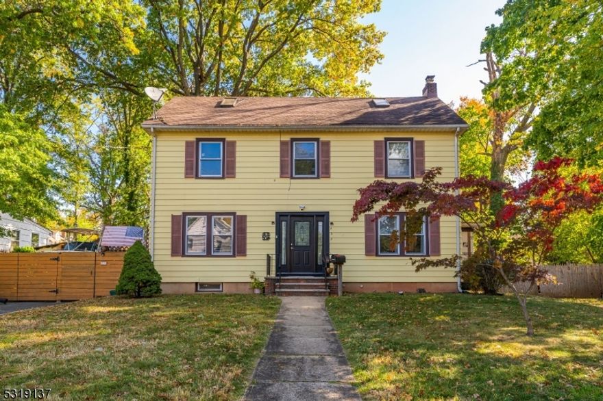 Step into this charming and spacious colonial home, perfectly situated on a large, beautifully landscaped lot. With 3 generously sized bedrooms, 2.5 bathrooms, and a host of inviting living spaces, this home offers the perfect blend of classic elegance and modern convenience. The first floor welcomes you with a spacious living room, featuring a cozy fireplace that sets the tone for relaxed evenings. Adjacent to the living room is a bright and versatile den, ideal for a home office, playroom, or additional lounge area. The well-appointed kitchen offers plenty of counter space and storage, leading directly to a formal dining room, perfect for hosting gatherings. A conveniently located powder room completes the first floor. Upstairs, you'll find three generous bedrooms, including a serene primary suite with an ensuite bathroom, plus two additional bedrooms and a full bathroom. The finished basement provides even more living space, whether you're looking to create a home gym, media room, or play area with a full bath. Outdoors, you'll love the expansive deck that overlooks the large yard ideal for entertaining, gardening, or simply enjoying the serene setting. A detached garage offers additional storage and parking plus a shed.This home truly has it all, combining timeless colonial architecture with modern upgrades and a fantastic location. Don't miss your opportunity to make this beautiful property your own!