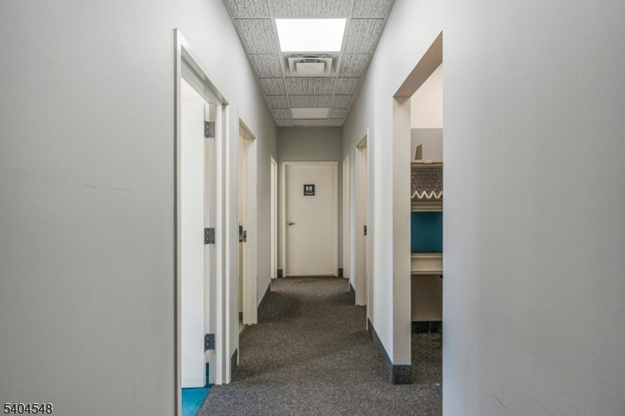 FOR LEASE - Professional medical office suite available for rent. Approx 800 Sq feet for rent.  Suite includes Doctor practitioner office, 3 exam rooms, nurses station, file room and private lavatory.  Lease includes use of shared spaces:  large patient waiting room, registration desk, nurses lab station, copy center, employee lunch room and other amenities.  Located in the highly desirable Millburn Medical Center. with plenty of parking spaces and easy patient access to building.  Handicap accessible.  Lease terms negotiable.  Exceptionally well-maintained building and medical suites.