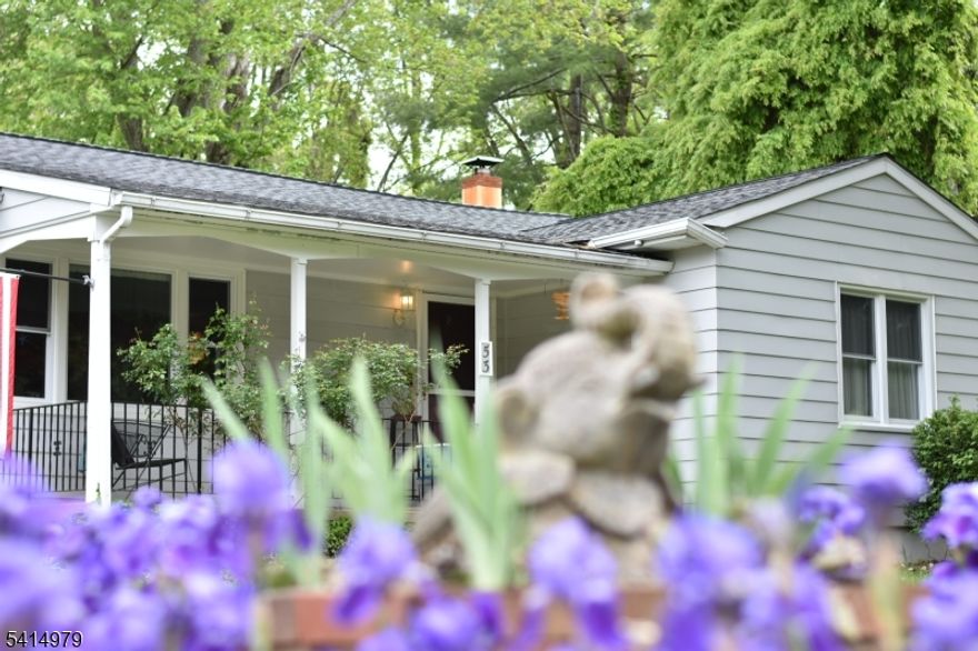 Welcome to this beautiful ranch home, blending classic charm with modern conveniences such as smart switch light bulbs, a programable thermostat for heating and a smart lock which can be used remotely on the front door. Gleaming hardwood floors grace the main living spaces, while durable tile and slate floors add elegance to the kitchen and entryways. The inviting kitchen boasts rich butcher block counters, ideal for cooking and gathering, plus a brand-new refrigerator for added freshness. Cozy up by the wood-burning stove in the living room on cooler evenings, creating a warm, welcoming ambiance. The main bathroom has been thoughtfully updated with contemporary fixtures and stylish finishes. Enjoy energy efficiency and abundant natural light thanks to brand-new windows throughout, paired with a recent new roof with a solar upgrade for long-term peace of mind. A dependable sump pump in the basement provides added protection and versatility. Step outside to a detached, electrically wired shed perfect for a workshop, storage, or hobby space. This move-in-ready ranch offers thoughtful upgrades and timeless appeal, ready for you to call home.