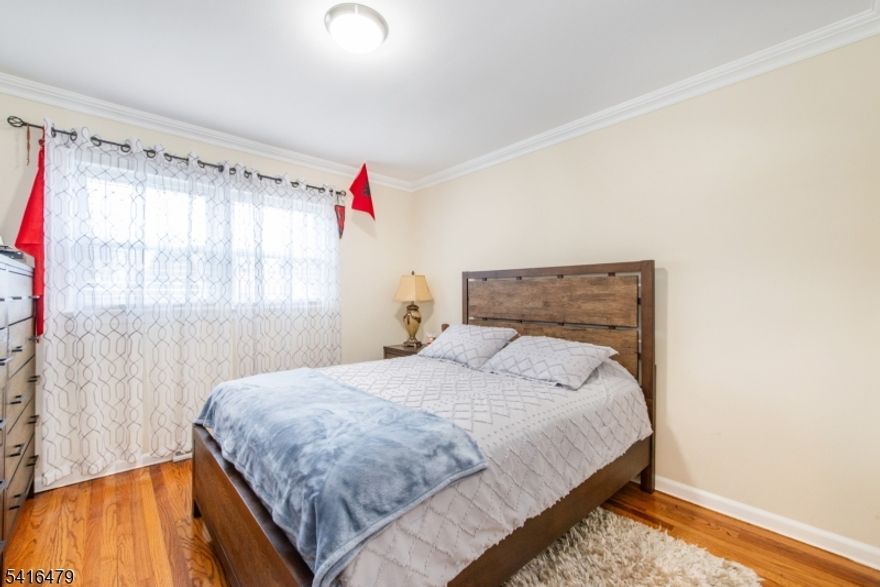 LOOK NO FURTHER!!! This updated 3-bedroom, 2-bath split-level home offers a bright, open layout with a renovated kitchen featuring custom cabinetry, granite countertops, a large center island, stainless steel appliances, and a tile backsplash that flows into the dining and living areas. Sliding doors lead to a private patio and backyard, perfect for relaxing or entertaining. Hardwood floors run through the main and upper levels, with new carpeting on the ground floor.Additional highlights include an oversized garage, two-car driveway, central A/C, and low-maintenance vinyl siding. The home is serviced by public water, sewer, and natural gas.Situated on a corner lot just steps from Pine Street Park and near Merriam Avenue Elementary, the property is also minutes from downtown Newton's restaurants and shops. Residents also enjoy community perks including free full-day preschool and complimentary membership to the Newton town pool.