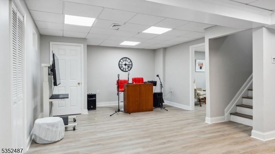 Welcome to this gorgeous mansion nestled in the serene residential area of East Brunswick, NJ. This exquisite home offers a beautiful blend of modern amenities and handmade carpentry, creating an inviting and luxurious atmosphere.Step inside to discover a spacious primary en-suite, along with three large bedrooms that provide ample space for the next home owner and guests. With 5.5 bathrooms, convenience and comfort are at the forefront of this stunning residence.The living room exudes elegance, while the dining room sets the stage for memorable gatherings. For those requiring a dedicated workspace, the office offers a peaceful retreat. Enjoy the sun-drenched sunroom, perfect for relaxation and enjoying your morning coffee.The chef's kitchen is a culinary dream, equipped with top-of-the-line appliances and an open layout ideal for entertaining. Outside, the property features an impressive 1600 square feet of deck space under an awning, along with a sprawling 2000 square feet of exterior patio, perfect for resort-style living.Completing this remarkable home is a spacious three-car garage, ensuring plenty of room for vehicles and storage. Don't miss the opportunity to own this stunning mansion, where luxury meets charm in a tranquil setting!