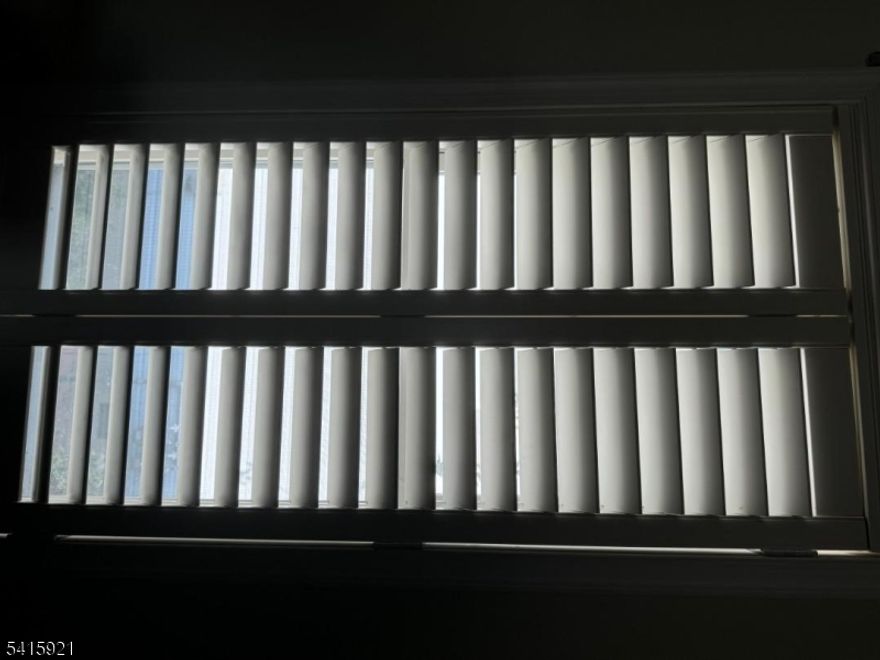 This very well maintained 2 family house with 3 bedrooms 1 1/2 bathroom on the 2nd floor and 2 bedrooms and 1 bath on the ground floor. Both apartments with dinning/living room and carpet through out both apartments except the kitchens and bathrooms. Central heat and central A/C. Garage for 1 car and driveway for 2 more cars. Very nice backyard with a shed for storage. Custom made blinds. You won't be disappointed!