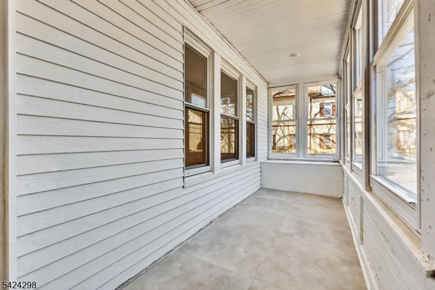 Fully renovated multi-family property offering exceptional versatility and income potential. This turnkey home features two spacious 2-bedroom, 1-bath units, plus a charming 1-bedroom studio in the finished attic?perfect for additional rental income or an additional living space.The property has undergone a complete gut renovation, showcasing modern upgrades throughout, including beautiful hardwood floors, new doors, new siding, updated electrical systems, and brand-new windows. Each unit is equipped with stylish new kitchen cabinets and stainless steel appliances, providing a contemporary and functional living environment.Additional highlights include a 2-car garage and an expansive driveway with parking for up to 3 more vehicles, offering ample convenience for residents and guests.Ideally located near public transportation, shopping, schools, and entertainment, this property is perfect for investors seeking strong rental potential or for owner-occupants looking to live in one unit while generating income from the others.Don?t miss this exceptional opportunity to own a move-in-ready, income-producing property in a highly desirable location.