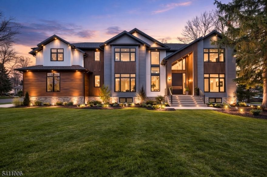 Experience Modern Luxury Redefined in this Stunning Masterpiece, Built & Designed by the renowned NJGCB, an award winning leader in Modern Architecture. Nestled on a quiet cul-de-sac, this New Construction home sits on a one acre lot, offering both privacy & space for Future Pool. Thoughtfully designed w/ Exceptional Craftsmanship, this Custom Home features 6 beds, 6.1 baths, 3 Car Garage - spanning 8,300 sq ft of Finished Living Space. Grand Foyer welcomes you w/Floating Glass Staircases, Massive Floor to Ceiling Windows, Skylights & High Ceilings throughout.  Formal Living Rm & Impressive Two-Story Family Room w/Gas FP & 20ft Ceilings. A Dramatic Two-Story Dining Room w/ 27ft Ceilings & Glass Wine Display.  Bi-fold Glass Door opens to give Panoramic Views of Covered Patio w/Outdoor Kitchen, Gas FP & Expansive Yard.  The Heart of this Home is your Gourmet Kitchen, where every element was Meticulously Crafted. Professional grade SS Viking appliances, an abundance of Sleek Custom Cabinetry, Center Island, Breakfast Room, Walk-in Pantry & Butler's Pantry.  An Oversized First Floor Guest Suite w/Full Bath & WIC offers convenience & accessibility. Large Storage Rm, Half Bath & Mudrm.  Second floor offers a Private, Beautifully Appointed Primary Retreat w/ Balcony, Gas FP, 2 Custom WIC's, Coffee Bar & Spa Inspired Bath w/dual Showers & Tub. Three Large En Suite Guest Beds w/WIC's & Laundry Rm.  Finished Walk-Out Basement w/ Media Rm, Bedroom, Bath, Gym, Office, Wet Bar & Rec Room.