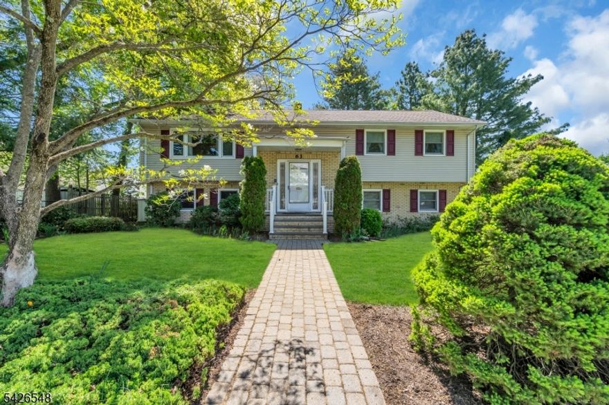 Welcome Home!  This well maintained and spacious 4 bedroom home situated on a desirable quiet street in  Springfield is a Dream! This home features a classic split-entry design, with a welcoming foyer that leads to both the main and lower levels.  The Upper Level boasts a bright and airy living room with large picture window, filling the space with natural light, and flows seamlessly into a formal dining room, which is ideal for gatherings of any size! An eat-in white kitchen offers ample cabinetry, counter space and perfect views of the private back yard. Hardwood floors often run through this level, adding warmth and character. The 1st floor is complete with 3 bedrooms, including an En Suite Primary Bedroom and an additional large white hall bathroom. Each bedroom has large closets! The Lower Level features a large bedroom and a family room with direct access to the backyard and a patio-perfect for entertaining and relaxing under the retractable awning. This level also includes a half bath and laundry room.  Additional Bonus Highlights include Generac Standby Generator, Crawl Space Encapsulation and Air Sealing, and a spacious 2 car garage. This home has it all and is ready for the next lucky Owner!!!