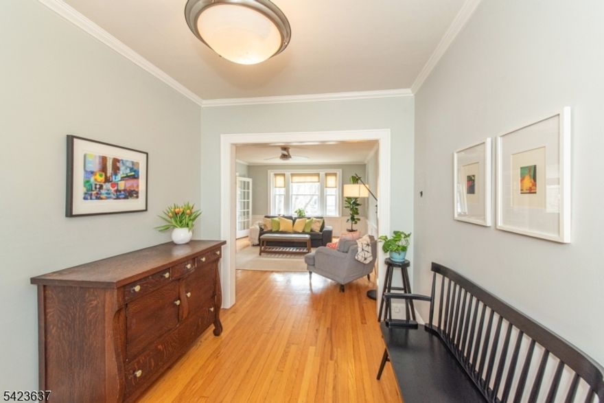 The largest unit in the complex!  At (approx.) 1189 sqft., this corner residence comes brimming with pre-war architectural craftsmanship. Located on a quiet tree-lined street just a turn away from the cultural heart of Bloomfield Avenue, the 3-bedroom residence (captive 3rd) at the Park Center community of classic elevator buildings was last seen on the market 10 years ago. Southern exposures bring natural light through oversized windows, illuminating the warm interiors honoring its period heritage: original hardwood floors, wainscotting and chair rails, high ceilings, moldings,and transoms. Its coveted position puts Bloomfield with the best of New Jersey along with the celebrated towns of Montclair and Glen Ridge nearby.  A true University town, you are amidst a tableau of acclaimed dining, museum and fine galleries, sophisticated boutique and chic shops, surrounded by  serene open spaces and lush green grounds of popular Brookdale and Watsessing Parks. Some say this trifecta neighborhoods feel like Brooklyn, others say the Up.West Side. Simply call it home. For the metropolitan lifestyle, connectivity is seamless - direct NJ Transit and Bus services to NYC, and convenient access to the highways ensure that the energy of Manhattan is never far, and the suburban calm always awaits your return.1st timers, downsizers, pied-a-tierre needs - this just might be it!   Coin-op laundry on site, assigned storage, 1 parking $25) &1 gar space ($65/mo), pet friendly.