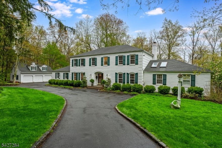 Set on a quiet cul-de-sac in the coveted Washington Valley section of Morris Township, this beautiful residence offers the perfect balance of privacy, scale and proximity to downtown Morristown. This home is designed for both refined everyday living and effortless entertaining. The expansive lower level features generous gathering spaces, a true chef's kitchen, and serene retreats with picturesque views-along with a convenient first floor bedroom suite ideal for guest or extended living. Throughout the home, custom built-ins, detailed millwork and carefully curated finishes create a timeless, elevated aesthetic. Upstairs the primary suite is a private sanctuary, highlighted by a luxurious bath, oversized walk-in closets, and a beautifully designed dressing area with custom storage. Additional bedrooms are well proportioned and share a tastefully designed bath. A rare offering, the three bay detached garage is complemented by a versatile loft space above-complete with a full bath, abundant storage, and a large workshop creative, recreational, or guest use. The grounds evoke a true estate setting with sweeping lawns, outdoor pool with hot tub and wooded acreage offering a "vacation at home" lifestyle year-round. An exceptional opportunity to own a private retreat just minutes from Morristowns vibrant downtown, dining, and transportation.