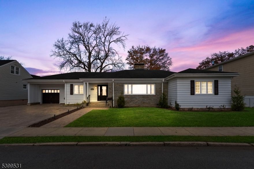 Welcome to one-floor living at its absolute finest! This fully renovated, move-in-ready ranch offers the perfect blend of modern luxury, comfort, and unparalleled convenience. The home features three spacious bedrooms and two updated, full bathrooms, designed with high-end finishes throughout. What truly sets this property apart is its one-of-a-kind lot for the area. The huge backyard is an entertainer's paradise and a true suburban retreat, boasting a magnificent custom-built outdoor brick oven perfect for unforgettable memories. Location is everything: situated approximately ten miles from Manhattan, this home is a commuter's dream, with NYC transportation within close proximity. The property also includes a convenient one-car garage and a large driveway providing lots of additional parking for guests. Don't miss the chance to own this suburban gem that perfectly marries easy accessibility with luxurious, comfortable living.