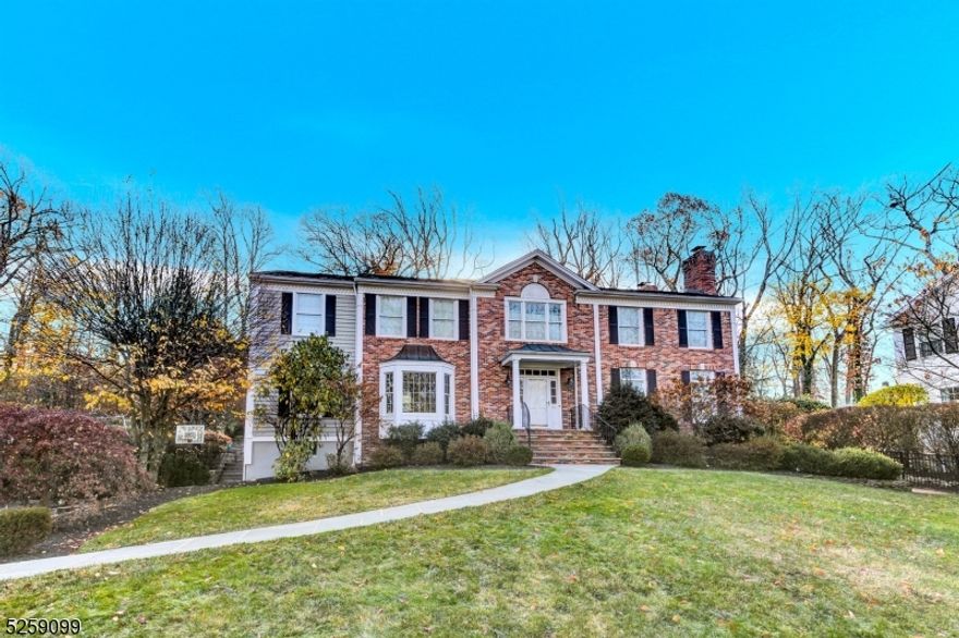 Welcome to this Stunning, Center Hall Colonial, built in 2001, in one of Chatham's most sought after locations. Highlights include: Gracious Floor Plan, High ceilings, Abundant Windows, and Gleaming Hardwood Floors!  First floor boasts two inviting gas fireplaces- one gracing the living room, the other warming the family room.  Adorned with bay windows, the dining room offers a charming ambiance. The heart of the home, the kitchen, impresses with granite countertops, top of the line appliances and walk in pantry.  Enjoy the convenience of first floor and second floor laundry facilities making chores a breeze. Step outside to discover a serene oasis - a bluestone front walk welcomes you, while a lavish brick patio overlooks the meticulously landscaped yard. Complete with lush greenery and professional planting, this outdoor space is perfect for entertaining or simply unwinding. Second floor has four generously sized bedrooms plus a spacious primary suite which boasts a tray ceiling, two walk in closets, a sitting room and full bath with double sink vanity and a spacious step in shower. The fully finished basement offers even more space to enjoy, with a mud room, huge recreational room and exercise room, complemented by a full bath.. Situated in close proximity to award winning schools and mid-town direct train. This residence offers both luxury and practicality and exudes timeless elegance and will please the most discerning buyer.