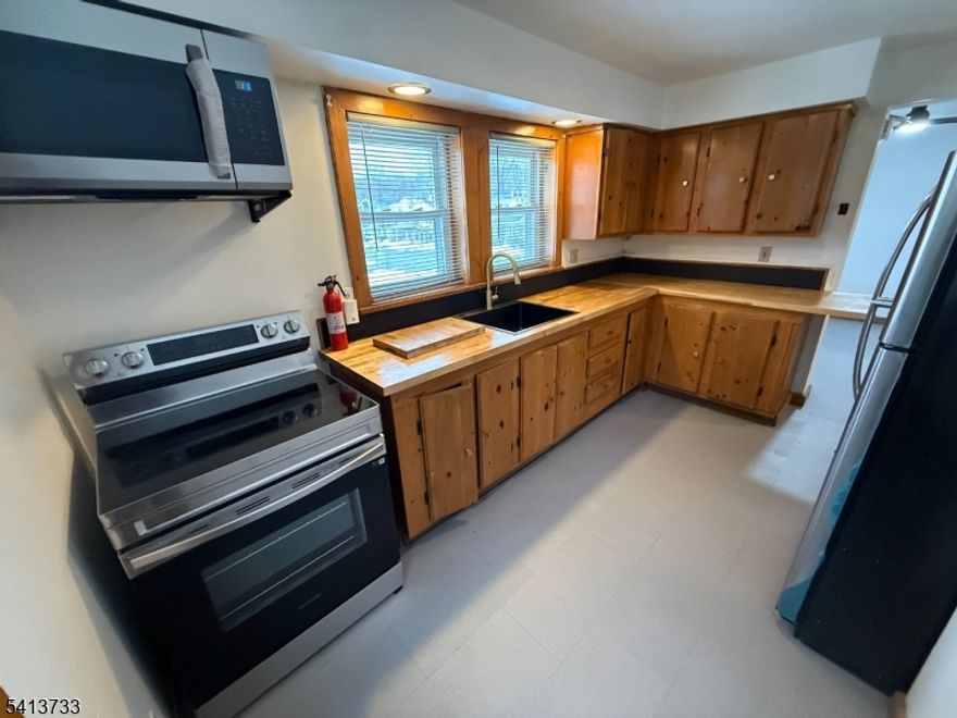 Beautiful one bedroom apartment located on the second floor. Unit has been freshly painted and recently updated! Kitchen features wonderful Stainless steel appliances and walks out to a private back deck and yard space! Large bedroom with closest space! Close to shopping and transportation! Off street and plenty of street parking! Rent includes water/sewer! Rent incentive for long term lease signing!