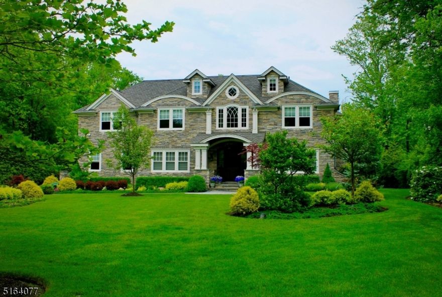 Eight Year Old PRISTINE CUSTOM RESORT STYLE ESTATE, located in prestigious Short Hills, NJ on almost one acre of property and just a short distance to highly rated schools, beautiful parks, fabulous shopping and NYC (25 miles). In this charming suburban neighborhood where bikes can be ridden on a semi-circle street, not one of the several heavily trafficked streets leading to the schools or train, is this DREAM HOME. As you step inside this majestic Center Hall Colonial, offering approx 10,000 sq ft of living space, you will immediately notice the quality and beauty that went into this home without being overwhelmed by its grandeur. Showcasing a dramatic two story foyer, elegant appointments, chef's kitchen, stunning stone wall in the family room, custom built-ins, 4 fireplaces, 7 bedrooms and 7.1 bathrooms, an elevator, study/office, playroom, walkout basement with rec room, gym, 2nd laundry room & BESPOKE HOME THEATER. This SMART HOME features Control4 Automation, Nest, 6-zone HVAC, Sonos, Samsung televisions in every bedroom, whole house gas generator & more. STUNNING BACKYARD with view of woods beyond is highlighted by a terraced Bluestone patio, outdoor kitchen, Gunite pool, spa, basketball half court, playset & outdoor speakers! Ask for Features List & Floor Plans/Tour link & request a tour today!