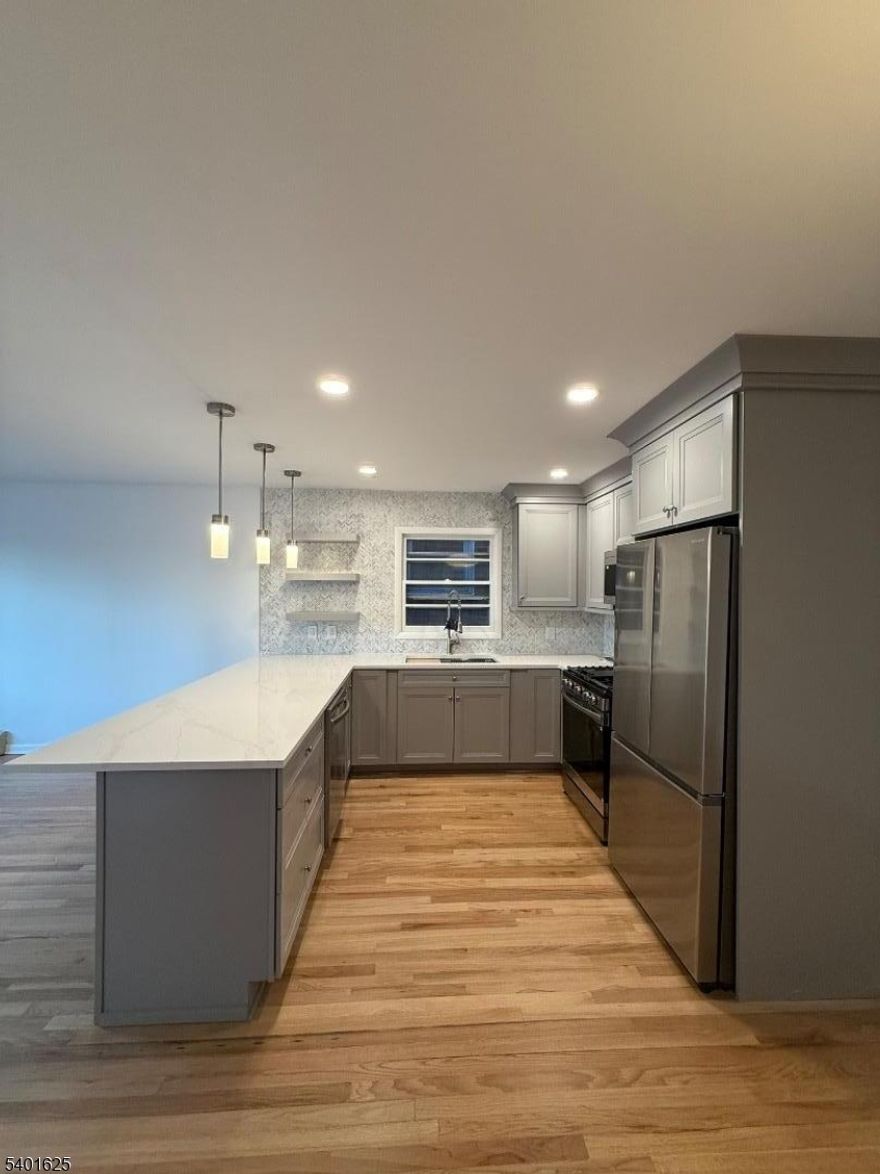 Beautifully renovated 3-bedroom apartment in a well-maintained two-family home located directly across from North Hudson Park in North Bergen. This bright and spacious unit features modern finishes throughout, brand new appliances, and a comfortable, functional layout ideal for everyday living. Parking is included, and a washer and dryer are available in the basement for added convenience. Enjoy park views and immediate access to walking paths, recreation areas, and open green space right outside your door. Perfect for commuters, the home is just a few blocks from NYC bus transportation with easy access into Manhattan, while also being close to shopping, dining, schools, and major roadways.