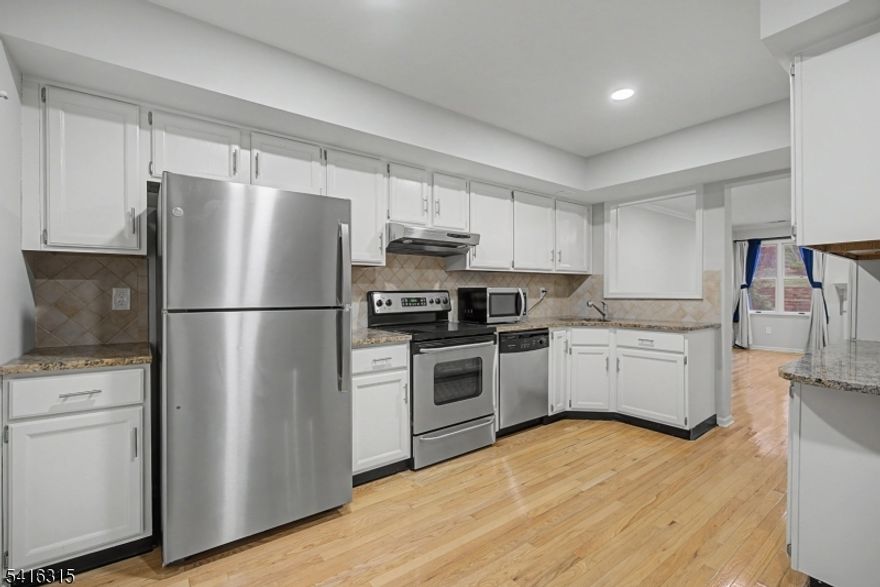 Welcome to this beautifully maintained 2 bedroom, 2.5 bath townhome in the highly desirable Hills community.  This inviting home features a freshly painted interior and a bright eat in kitchen with plenty of space for casual dining.  The spacious layout offers comfortable living and entertaining areas, along with the convenience of an attached garage and in-unit laundry.  Upstairs you will find two generously sized bedroom, each offering privacy and comfort.Ideally situated close to shopping,dining and major highways, this location is perfect for commuters while still offering a peaceful community setting.