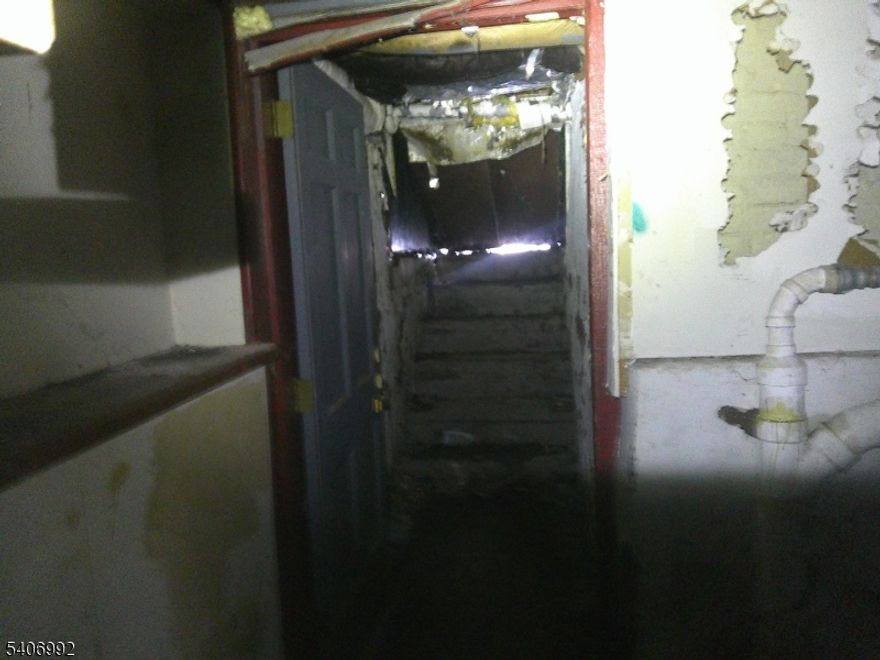 Estate sale of two story all brick two family. .  Vinyl replacement windows installed.  Two separate gas meters, separate electric, separate hot water heaters and two Crown boilers.  Property in need of repair.   Washer/Dryer hook up in basement. Bilco door installed.   Double size lot.  Close to schools, public transportation and major highways.