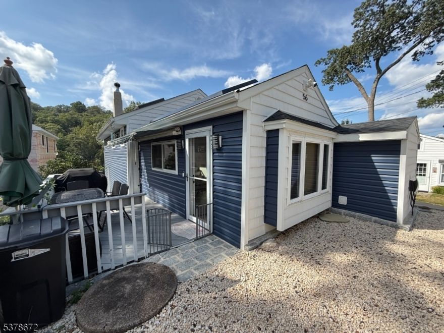 Laketastic Lake Living!  Lake style home remodeled with amazing designer finishes, 3-bedroom 2 full baths home with your own dock and patio area, Hot Tub, & entertaining patio. Enjoy the cove, did I mention it's a no wake zone and no grass to cut! It's not just a home but a lifestyle. Walk to local restaurants, deli and easy access to Main Lake! Enjoy your own private Hot Tub on the deck! A beautiful Cove to boat, swim sail, fish,. Canoe or sip a drink on your dock! Come visit this Laketastic Home! Third bedroom is now the Game room but can be converted back!