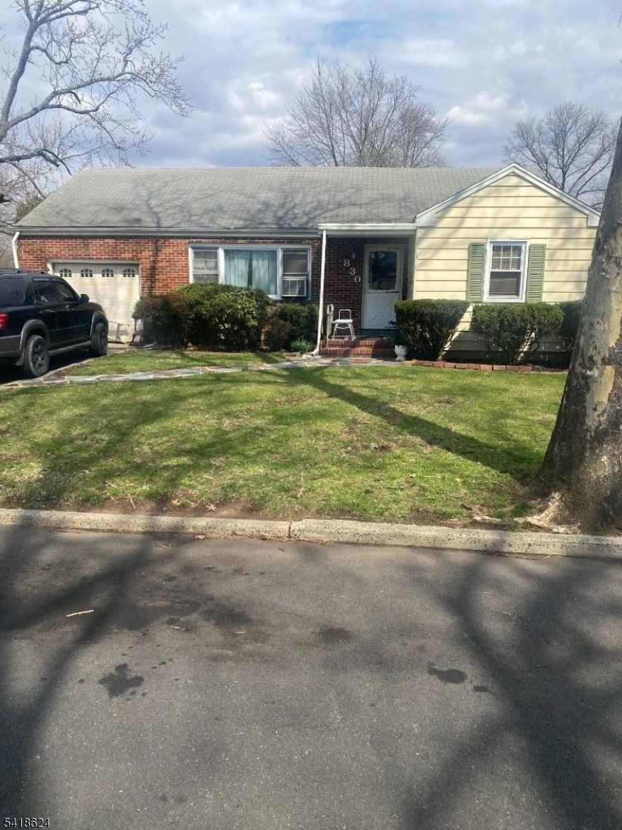 This large brick front Colonial house offers wonderful curb appeal and is ideally situated on a large corner lot on a quiet residential street. The house has 3 bedroom 2 bath and is MOVE IN CONDITION. The master bedroom suite comes with a full bath.. The house offers an open concept  with living room , seperate dining room and gallery style kitchen that opens to a large Den which is perfect for sitting and relaxing. The Den exit to back yard. There is full finished basement with space for your use, laundry room ,utility room and large attached garage..This is a wonderful opportunity to own a home that blend space, comfort and convenience.                    Seller Concession.