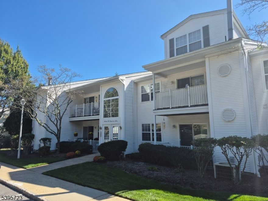 Spacious and  Bright, this 2nd floor two bedroom condo is located on the same level from the parking lot in the desirable Season's Glen.  Den can be your home office or guest room.  Crown moldings and recess lights throughtout. Updated Kitchen features granite countertops, natural stone backsplash, under cabinet lightings and more . Large Living/dinning room with walkout slider door to the Balcony overlooking beautiful valley natural view. Secured access, assigned parking & additional guest parking, detached basement storage.  Amenities include outdoor ground pool, kiddie pool, tennis court, clubhouse, playgound, billiards/game room, exercise room and more.  Near Rt 80, 46, 10, 15, NYC bus & Train station, shopping mall/restaurants/Movies...