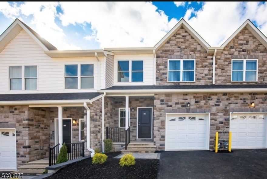 Brand new townhouse complex, Mountain Way in one of Parsippany's most sought out neighborhoods!  Sycamore Model is a rarity with a Dining Room and generous sized Family Room with open concept Kitchen!  Walk into the double story foyer, high ceilings, with an open concept. Bright and airy with neutral colors.  Hardwood floors downstairs, gas fireplace and deck. Carpeted stairs lead you to the upstairs wall to wall carpeting living area.  Two generous sized bedrooms at the back of the hallway with a full bathroom outside the rooms.  Generous sized Master Bedroom with full Master Bath inside room. This ideal location, while nestled in the mountain landscape of Morris County is also a commuter's dream - close to various NJ transit buses and trains, and all major highways, including Route 287, Route 46 and Route 10 - you are only 30 miles away from NYC!