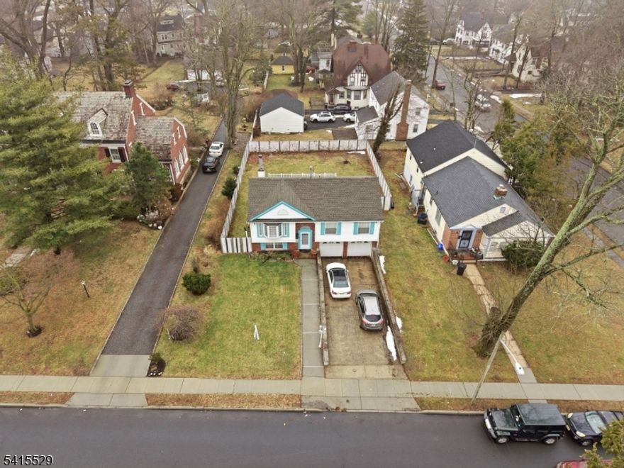 Nestled between Heywood avenue and Tremont avenue,  674 Berkeley avenue is the  quintessential  Split Level house that boast a classic Bay window and a combination of red brick and vinyl sidings. Pull  in the driveway and access the two cars garage adjacent to the  ground level which houses a family room/ game room, laundry room and full bathroom. The dining room leads  to the overside deck great for outdoor entertainments and cookouts. The property features a formal dining room, living room, three bedrooms and three full bathrooms. This Seven Oaks gem enjoys a close proximity to NJ Transit trains, major highways and parks