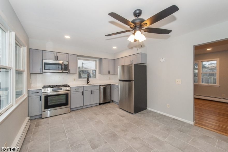 Rare opportunity to own a fully renovated, side-by-side duplex in the heart of Pompton Lakes, offering the perfect blend of modern luxury and investment potential. Completed in 2024, this property has been transformed from top to bottom with a brand-new roof featuring a transferable 50-year warranty, ensuring decades of maintenance-free living. Each spacious unit functions like a private townhome, providing a total of four bedrooms, two full bathrooms, and two half bathrooms across the property. Inside, the units feature bright, open floor plans with refinished flooring, contemporary kitchens, and updated bathrooms that cater to the demands of today?s renters and homeowners alike. Adding to the convenience, each side includes its own attached garage, a highly sought-after feature that provides both secure parking and additional storage. The location is unparalleled for those seeking a suburban lifestyle with urban accessibility. Situated just moments away from the vibrant Pompton Lakes downtown, residents can enjoy easy access to local shopping, dining, and community parks. For the daily commuter, the property is ideally positioned near NYC transportation, offering a seamless stress-free journey into the city. With every major upgrade already completed in 2024, this duplex represents a rare chance to acquire a worry-free property in one of Passaic County?s most convenient and charming neighborhoods.