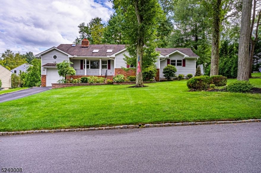 This beautiful split level home in a sought after neighborhood checks all the boxes. BRAND NEW ROOF & added insulation. Cathedral ceilings, hardwood floors, recessed lighting, skylights, crown molding, granite counters, stone/glass backsplash, tumbled marble tile floor. All meticulously maintained and freshly painted throughout. Lots of Generous Room Sizes to Spread Out & Make Your Own! You will be sold the moment you walk through the front door. Bright space w/oversized front window and brick corner, floor to ceiling fireplace. Formal dining conveniently located off the updated gourmet kitchen equipped w/41in cabinets, chef grade appliances, breakfast bar, pantry, wine fridge and butler's pantry. An ideal home for everyday living and entertaining. Slider to back deck! 2nd floor hosts a primary suite with jetted tub and stall shower & 2 additional bdrms and full bath. Optional 4th bdrm or office on ground level along with half bath, exercise room and large family room with gas fireplace. Walk out to the backyard! Unfinished bsmt and two attics is a huge BONUS providing plenty of storage in addition to 1 car garage and the 2 sheds on property. Enjoy the private backyard w/deck & patio. Great location near NYC Midtown direct Train Station and the community's lovely amenities - private pool club, tennis courts, pickle-ball, playground just down the street! Short walk to Schools & Library. Easy access to major highways and airports. Please see doc attached for more home features.