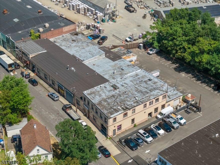 Unlock the potential of this 23,275 SF industrial/warehouse space in a prime Clifton location. Featuring a 17' clear height, large drive-in bay, open floor plan, central A/C, private restrooms, recessed lighting, and a security system, this property is ideal for light manufacturing, distribution, or storage. Ample on-site parking and easy access to Route 21, Route 3, the Garden State Parkway, and NYC make it a strategic choice for growing businesses. Listed rate includes utilities, building services, and property expenses.