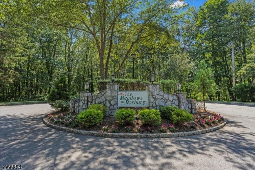 Welcome to The Meadows, a highly sought-after townhome community in Roxbury. This desirable 2-bedroom, 1.1-bath end unit is East-facing, filled with natural light, beautifully maintained, updated, and truly move-in ready. Freshly painted, it features a long list of 2024 upgrades including new patio doors with built-in blinds, custom window blinds throughout, new baseboard moldings, recessed lighting, a WiFi-enabled smart thermostat, and smart switches. Luxury vinyl flooring runs seamlessly throughout, creating a modern, cohesive look. The kitchen stands out with rich cabinetry, granite countertops, a tile backsplash, stainless steel appliances, and a side window that brings in plenty of light. The bathrooms have been tastefully updated with new vanities and upgraded fixtures. A cozy gas fireplace anchors the inviting living room, while a grill-ready deck with a built-in gas line offers a rare and convenient feature. Additional highlights include a one-car garage and a fantastic location just minutes from shopping, dining, schools, medical facilities, Routes 10, 46, and 80, and the Mount Arlington Train Station. Located in a well-regarded Morris County school district and less than two miles from the Horseshoe Lake Recreation Complex and beach, this home offers style, comfort, and unbeatable convenience. An existing home warranty will be transferred to the new buyer at closing, offering added peace of mind. SELLERS ARE HIGHLY MOTIVATED !!