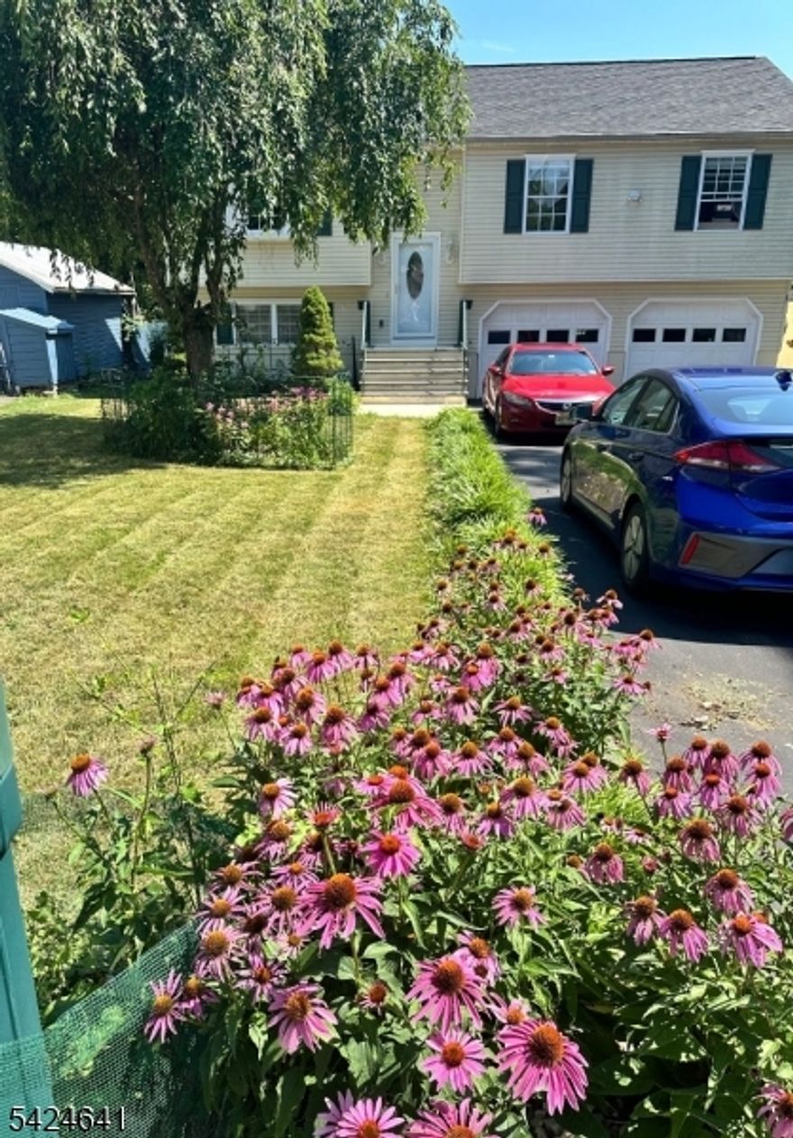 Welcome to this charming bi-level home tucked on a quiet street in Washington Borough! Offering 4 bedrooms and 2 full baths, this home features a bright and functional layout with a spacious living/dining combo, updated kitchen with center island and pantry, and a full bath conveniently located on the main level. The lower level boasts a large family room, additional bedroom, and flexible space perfect for guests, work, or play. Enjoy outdoor living on the deck overlooking a wooded, private lot complete with fencing and storage shed. Additional highlights include a 2-car built-in garage, central air, and public utilities. A wonderful opportunity to own in a desirable location close to major routes, shopping, and dining!Professional Photos being taken this week.