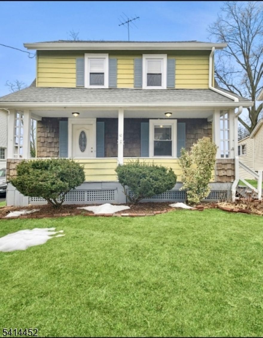 Gorgeous Classic Colonial in North Plainfield, 3 BR, 1.5 Bath. Beautifully appointed colonial offering 3 bedrooms and bright, stylish living spaces. The modernized chef's kitchen features stainless steel appliances, quartz countertops, ample cabinet storage and a breakfast area that flows easily to the yard. Main bathroom is tastefully revised with double sinks; additional bath finished with contemporary touches. Comfortable living room anchored by a modern fireplace and upgraded lighting fixtures throughout create a warm, stylish atmosphere. Formal dining room ideal for entertaining. Inviting open front porch and a a generous back deck overlooking a spacious backyard, perfect for outdoor dining and play. Recent updates include newer appliances, roof and gutters. This home features a walk-up attic with plenty of insulation. Two-car detached garage and plenty of off-street parking. Prime North Plainfield location, close to schools, parks, public transportation, major highways and shopping. A perfect blend of classic charm and modern convenience.