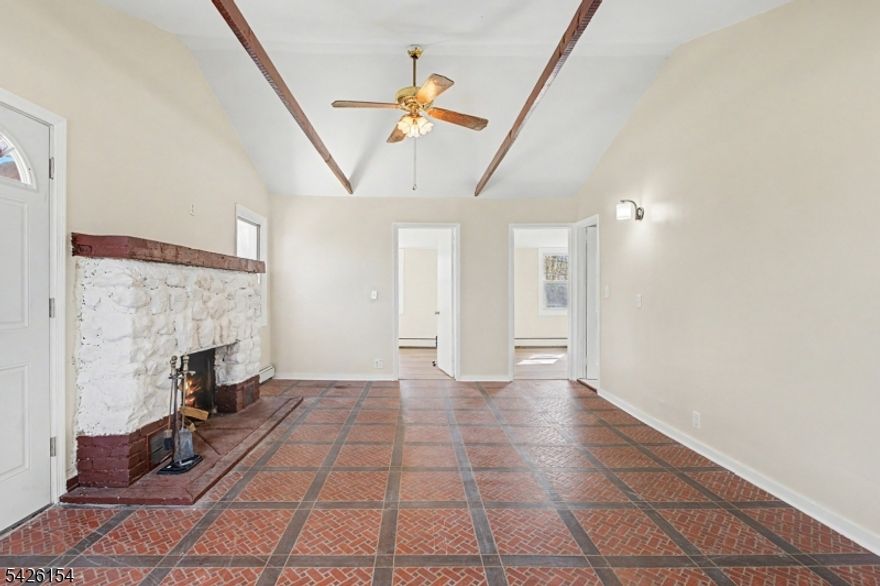 Move-In Ready Cottage with Expansion Potential:  Charming, fully renovated 2-bedroom cottage set on over half an acre in Boonton Township. Features include a brand-new kitchen, updated full bath, and a spacious living room with a stone fireplace and wood-burning stove insert. The property also includes a private yard, large patio, and outbuilding. The oversized lot offers endless possibilities for expansion or building a larger home. Convenient location with access to recreation, shopping, and major highways. Zoned for Mountain Lakes High School.