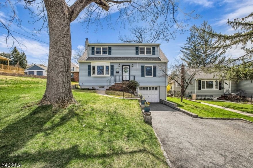 A home where your story begins! Beautifully maintained; instantly feels warm, inviting, and full of sunshine! From the moment you arrive, you'll love the charming curb appeal, spacious driveway, and perfectly set property. Step inside to a bright and airy LR with gleaming hardwood floors, oversized brand-new windows, and a seamless flow that makes everyday living and entertaining effortless. The layout opens beautifully from room to room, creating that "this just feels right  vibe. Brand-new kitchen ready for it's new home chef. Thoughtfully designed spaces throughout make this home both comfortable and functional inside & out! Enjoy a great yard perfect for relaxing or hosting. Conveniently located close to NYC transportation, top-rated schools, restaurants, and shopping this is the one you've been waiting for! Don't delay...make your move before it's gone away!