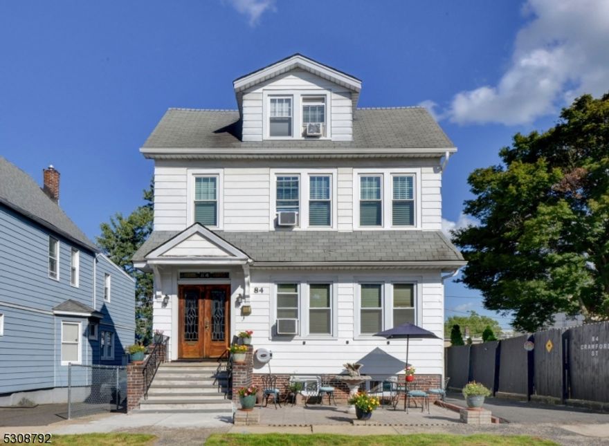 Pride in Ownership here! Introducing a fantastic opportunity... this spacious 2-family BOAsts additional living space in the basement, converted garage and attic. Home will be delivered 100% vacant. 4 Bedrooms, 2 full baths plus additionals being sold as is. Beautiful wood floors, natural wood trim and crown moldings throughout. Updated bathrooms! Basement is walk out with multiple rooms, partially finished and has two sets of washers and dryers. You'll love the added living space of a private oasis in the backyard, complete with full bath with tiled shower stall, skylight and summer kitchen (not permitted). Separated utilities! Other features: roof partially redone in 2017, solar panels for lower electric bills (see information in document section), tons of storage, walk up attic. STRICTLY SOLD AS IS. Terrific commuter location: minutes from 280 and GSP and NYC bus stop right up the street.