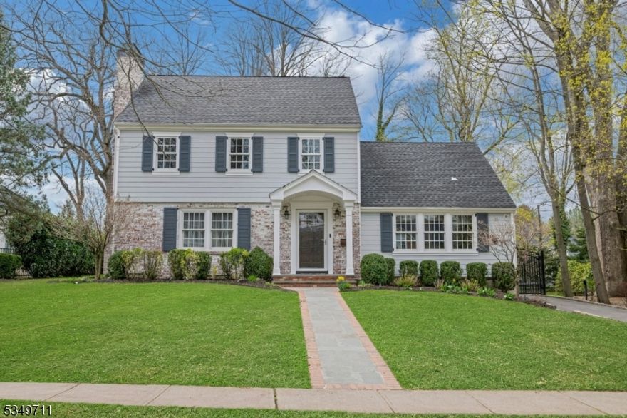 Location!  Ideally located just blocks from vibrant downtown Summit, Kent Place School, Lincoln-Hubbard Elementary, and close to the Summit Train Station, the best of Summit is right outside your door.  Inside, elegant millwork adds timeless character to the living and dining rooms.  The updated kitchen features soapstone countertops, top of the line stainless steel appliances, and a spacious island all flowing seamlessly into a bright, open family room.  Glass doors lead to a beautiful bluestone patio and a well-manicured, private and flat backyard   perfect for outdoor entertaining or everyday enjoyment.  A mudroom with built-in cubbies is located off of the 2-car garage.  Upstairs, you'll find four bedrooms, including the primary suite with its own ensuite bathroom.   A spacious hall bathroom with a double vanity serves the remaining bedrooms.  The finished basement adds incredible flexibility with space for a playroom, home office or gym, plus a full bathroom.