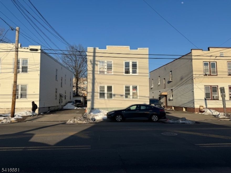 Attention investors, great opportunity to own a four-family property! Each unit offers 2 Bedrooms, 1 Full Bathroom, an Eat-in kitchen, and a Living room, with separate utilities for added convenience. Unit 1 is has been updated with new Kitchen and new Bathroom. The property features two common driveways with a total of four parking spaces, two on the right and two on the left. Conveniently located close to shopping, dining, transportation, and major highways.