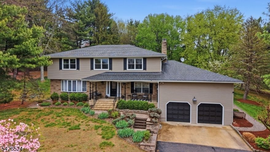 Beautifully maintained colonial set on a private, landscaped 1-acre lot with long-distance views of Spruce Run Reservoir and the surrounding countryside. The backyard is perfect for relaxing or entertaining, featuring an in-ground pool, gazebo with electric, and a spacious outdoor patio with fire pit.This warm and inviting 3,408 sq. ft. home offers a welcoming rocking chair front porch and a bright two-story foyer with a curved staircase. The updated eat-in kitchen includes custom cabinetry, granite countertops, stainless steel appliances, and a center island, and opens to the formal dining room.The living room is filled with natural light from a large window, while the family room features a fireplace, custom bar, and direct access to the outdoor entertainment area?ideal for gatherings.A first-floor multi- purpose room provides a great option for a home office or flex space.Upstairs, the spacious primary suite is complemented by four additional bedrooms and a full hall bath.Located in a Blue Ribbon school district and just minutes to NYC transportation, this home is also close to all that the charming town of Clinton has to offer.