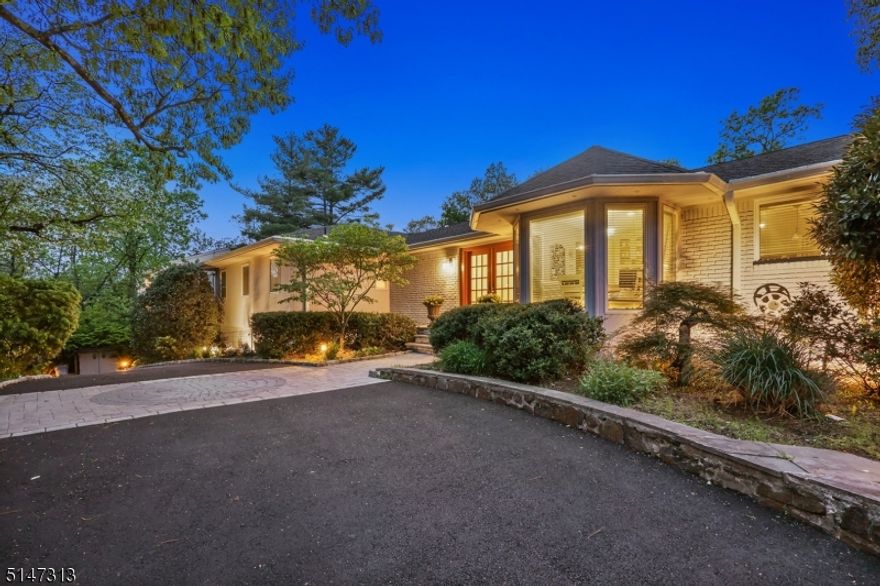 Fabulous ranch on a beautiful, landscaped property with newly built in-ground pool & large stone patio overlooking Chestnut Hill. Situated on over .5 acre level lot with fenced backyard offers great privacy & endless entertaining spaces, this is one-floor living at its best! Open floor plan with gleaming new finished hardwood floors & plenty of natural light throughout. The spacious entry foyer leads to a gorgeous living room with vaulted ceilings, recessed lighting, & a double fireplace connecting to the family room. Gourmet eat-in kitchen with granite countertops, custom cabinetry, double wall ovens & breakfast area. Lovely primary suite features his & hers custom fitted walk-in closets, built-in bookcases, spacious primary en-suite bathroom with double sinks, jetted jacuzzi tub & walk-in steam shower. Living room, dining room & primary suite all have access to outdoor patio and pool area. Walls of glass make the beautiful grounds always visible. Walkout lower level offers ground level 4th bedroom & rec room, office, media room, powder room, a full bath & cedar closet with no shortage of extra storage space! Unique home features include Philips Hue & Kasa Smart outdoor lighting, Smart sprinkler system, multi-zone surround/stereo system with wall volume controls in living area & outdoors, and myQ Smart Garage. Many other new/update include: Driveway, Fence, HVAC...This tasteful home is absolutely move-in ready with a great location in one of the best sections of Livingston.