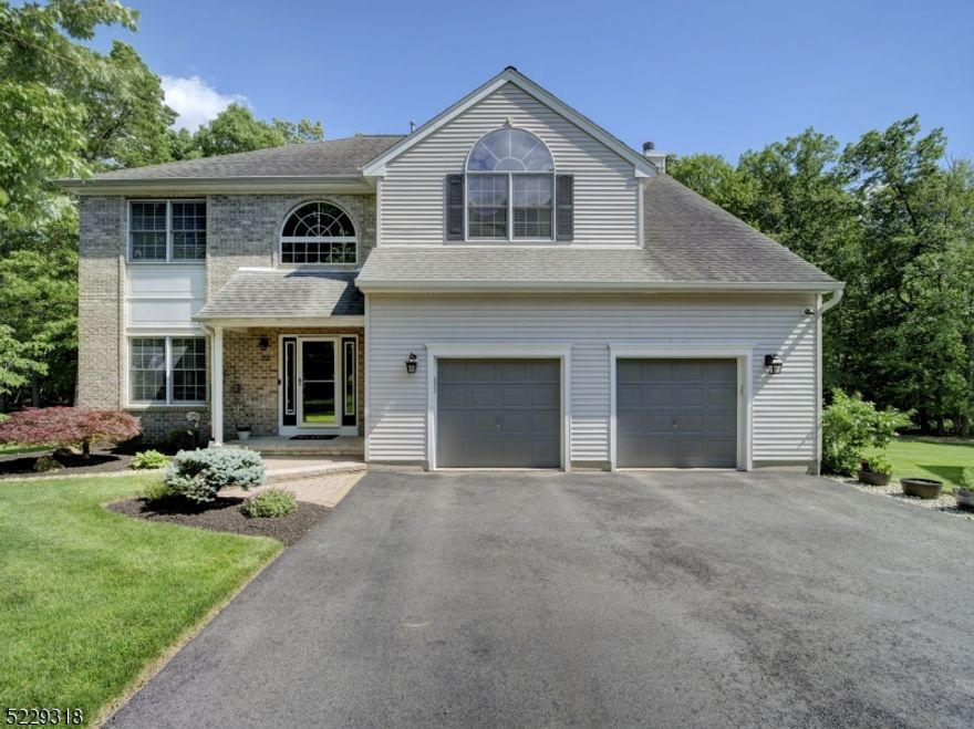 Your dream home awaits! Renovated, updated & upgraded with timeless choices & perfectly situated on a flat lot w a big yard that backs to woods. This 4 bedroom, 2.5 bath beauty has been meticulously maintained & has many of today's buyers' desires. Discover a very spacious open floor plan, showcasing special finishes that elevate its aesthetic appeal & value, 2 story foyer entry will wow you w its palladium window, beautiful wood staircase w iron railings. The gorgeous brand new kitchen(2024) features quartz ctops, 42' cabinetry, reverse osmosis water filter, garbage disposal, pantry & separate dining area adjacent to huge family room with gas fireplace w/marble inlay. It leads to a 2 tiered trex deck designed for social gatherings & hot tub for relaxation & hydrotherapy Ascend to 2nd floor to nice size laundry room with storage shelving, generous sized bedrooms, main bath & absolute dreamy primary suite complete w large area for sitting room and/or home office space, 2 walk in closets plus a 3rd. Its luxury bath has been renovated w dual vanity, huge shower & heated floors. Full finished basement has 9' celing, great storage & the perfect space for recreation, home office, exercise room, etc.2 zone HVAC, underground sprinkler system plus underground drainage system & public utilities provide efficiency & peace of mind. 2 car garage has epoxy coated floor, electric car charging station,storage & utility sink. Bonus- wood flooring, upgraded lighting & crown molding. A MUST SEE