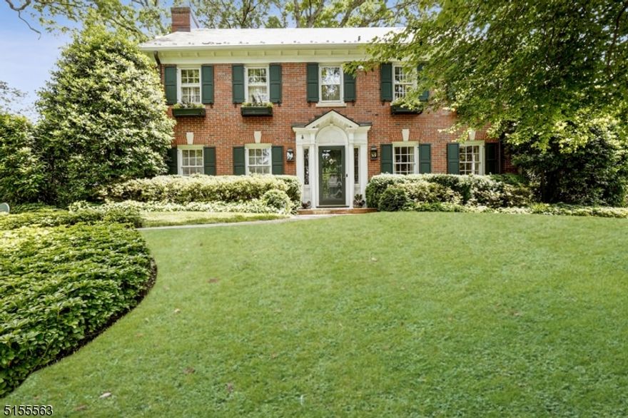 37 Hawthorne is a charming 1934 brick Georgian Colonial set back on a knoll. From the foyer, an elegant DR & spacious LR w/ fp are seen through arched openings. 1 st Fl features a cozy sunlit Family Rm, Office w/ private French door garden entry, ideal for working at home. A timeless gourmet Kitchen, w/ custom cabinetry, Sub Zero, Viking stove & Bosch DW. The breakfast nook/ built-in banquette is framed by lovely garden views. Upstairs are 5 BRs & 3 full baths. Primary en-suite is luxurious w/ fabulous mirrored walk-in closet, built-in hampers & concealed lg screen TV. Bath features heated marble floor, his &her vanities w/ abundant storage, private WC, large dressing vanity & coffee bar. Other 2 full baths are classic w/ marble floors & subway tiles. The original architectural details make this a truly special home. Additional amenities: generous closets, classic moldings, wainscoting, quarter sawn hardwood floors, custom drapery, Designer lighting, underground sprinkler system, whole house generator, wide driveway w/ 2 more parking spaces. Basement features fitness area, TV room, 1/2 bath, 3 lg storage closets, mud room w/access to a 2-car heated garage, extra washer & dryer in utility rm. Fenced in backyard w/perennial gardens, brick patio, natural gas grill & stone walls. EASY 10 minute walk to Downtown Millburn, train station, PaperMill Playhouse & S. Mountain reservation. Millburn is a quick commute to NYC and has one of the top rated public school districts in NJ.