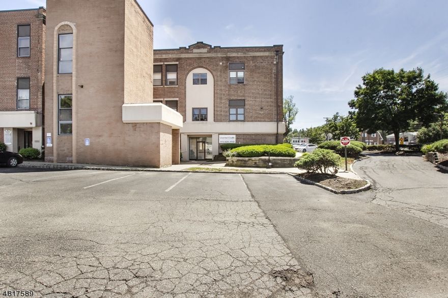 Remodeled 1st fl corner unit, private entrance, handicap accessible, lots of parking. Great location, easy access to downtown and major highways. Unit offers 3 offices, kitchen, full bath w shower, conference room, reception area, and additional 30 x 17 office area great for cubicles.  Two separate entrances great rental income (currently rented for 950/month). Newer windows. Freshly painted. CAM fees include exterior maintenance, snow removal, heat, hot water, AC, sewer, & garbage. Owner pays taxes & electric. There are 5 interior heating units (electric is one bill). Shared cooling tank on the roof additional heat and air conditioning per owner.