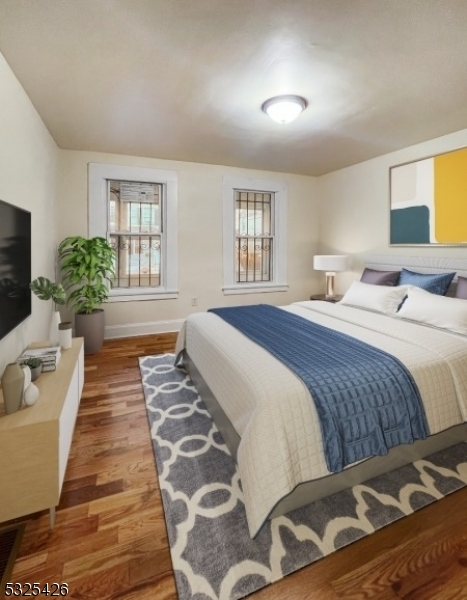 Welcome to 48 Pierce St, Newark, NJ! Introducing this modern renovated gem that defines modern urban living. Strategically positioned in the heart of Newark, boasts a prime location with easy access to schools, parks, shopping, and transportation. Meticulously renovated from top to bottom, the property offers a turn-key experience with fresh paint, beautiful flooring, and contemporary design elements throughout. Features a modern kitchen equipped with stainless steel appliances, granite countertops, and ample cabinet space. Bathrooms have been beautifully updated, offering space and modern design.