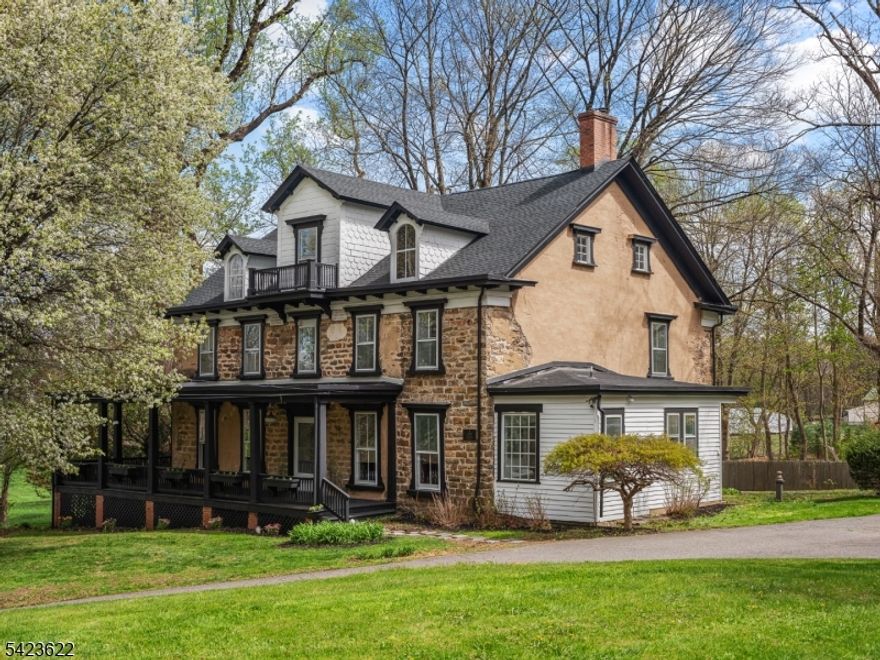 Welcome to The Old Fort, a standout property in the heart of Long Valley, offering a unique blend of character, space, and flexibility. Set on 1.68 acres, this property provides privacy, open space, and a picturesque setting while still being centrally located. Originally built circa 1774 and updated over time, the home combines timeless style with practical living. The main residence features 5 bedrooms and 3 bathrooms, with classic stone construction, high ceilings, and distinctive architectural details that give the home a warm, vintage feel without sacrificing functionality. The rooms are spacious and filled with natural light, making it easy to enjoy as-is or customize to your taste. What truly makes this property special is the presence of two separate homes on one lot, a rare and highly valuable opportunity. In addition to the main house, there is a second dwelling with 2 bedrooms and 1 full bathroom, currently vacant and ideal for rental income, in-law suite or a private guest house. With its acreage, versatility, and strong income potential, The Old Fort offers a unique opportunity for today's buyers looking for both character and value.