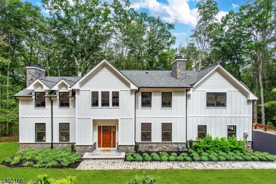 Welcome to your dream home where modern sophistication meets farmhouse charm! Step into the  breathtaking foyer where soaring ceilings and expansive windows flood the open concept floor plan with natural light. This brand new modern farmhouse boasts 4 beautifully appointed bedrooms each with their own luxurious bath ensuring comfort for all. The grand primary bedroom is a true retreat, offering  a view of the tranquil forest, a large spa like bathroom with freestanding tub and a spacious shower and a walk in closet that dreams are made of.  Imagine unwinding after a long day in your personal oasis, surrounded by the serenity of nature just outside your window. Enjoy hosting gatherings in a space where the kitchen seamlessly flows into the living and dining area, creating a perfect backdrop for unforgettable moments.  The sleek design and contemporary finishes offer a fresh take on a classic charm, blending style and functionality with ease. From morning coffee on the deck to cozy evenings by the 3 fireplaces that create warm, inviting spaces in the family room, living room and dining room making for cozy gatherings and tranquil evenings. The kitchen is a chef's delight, equipped with top of the line appliances that make cooking a joy.  Whether you're preparing a simple meal or hosting a grand feast, this kitchen is designed to impress. With easy access to thriving Morristown, trains to NYC and major airport, do non miss out on this rare opportunity to own a slice of paradise!